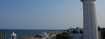 Beach with a 19th-century lighthouse